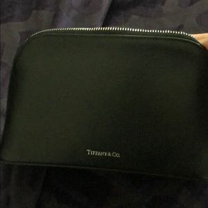 Tiffany and Co small, black cosmetic bag.